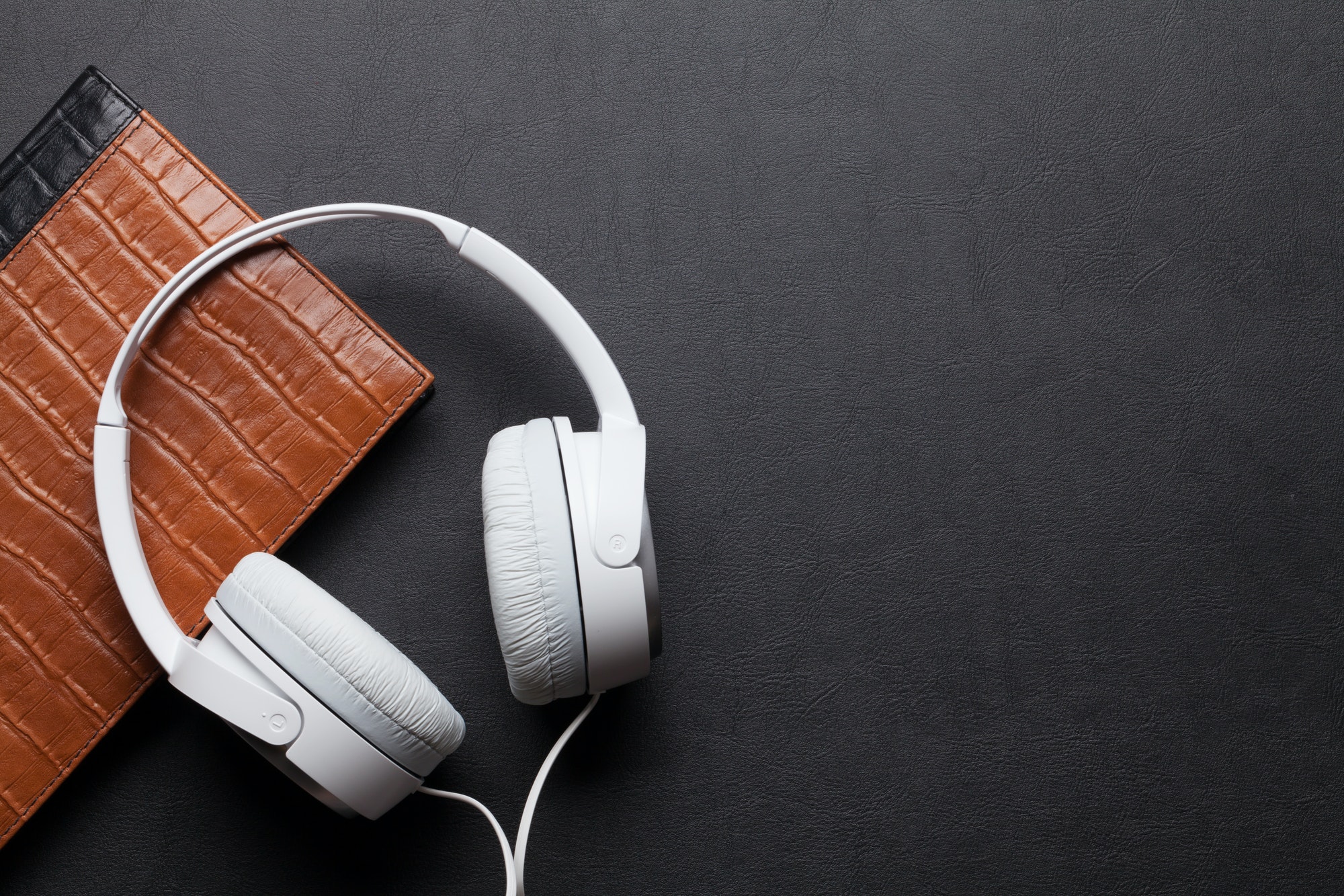 headphones and notepad